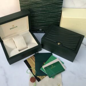 Rolex box and paper