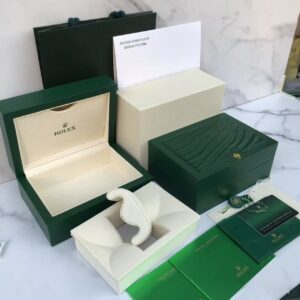 Rolex box and paper